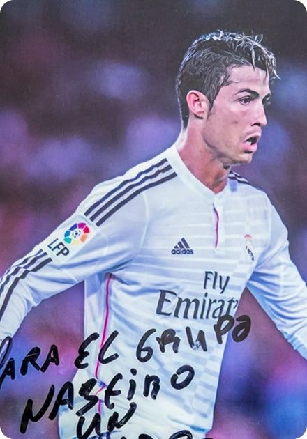 Cristiano Ronaldo in a white Real Madrid jersey, with handwritten text "PARA EL GRUPO NASTINO" across the lower left.